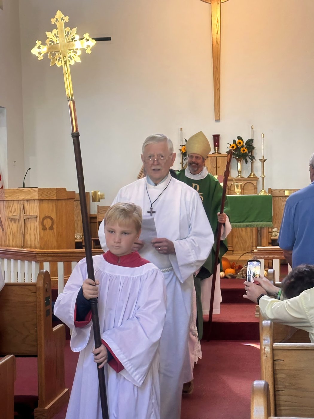 Cross bearer leading the worship procession